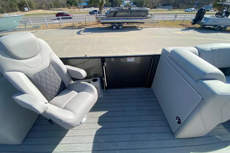 Slide: The Image of 2024 Starcraft SLS 3 boat interior with gray seating and deck view. - 7