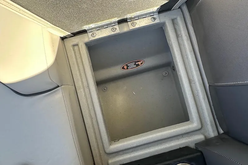 Slide: The Image of Storage compartment in 2023 Harris Cruiser 230 boat interior. - 29