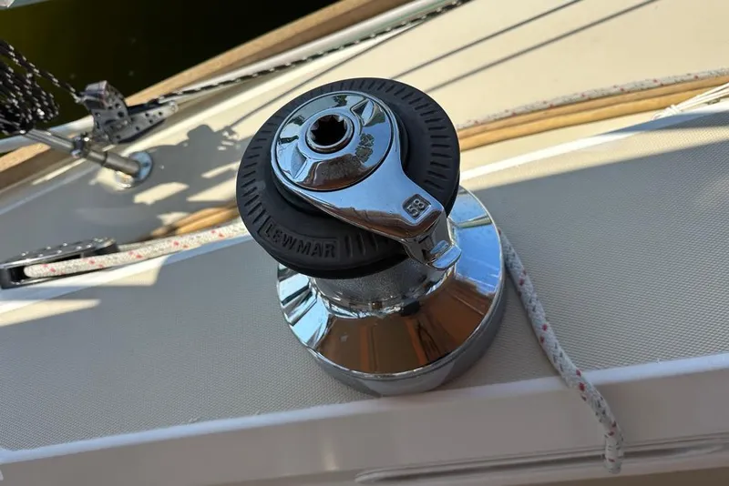 Slide: The Image of Winch on 2002 Sabre 402 sailboat deck, featuring Lewmar branding. - 21