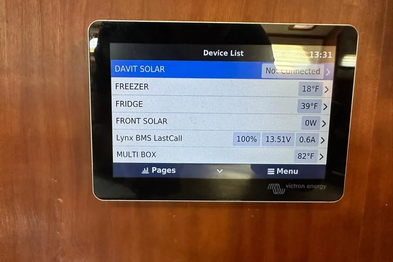 Slide: The Image of Touchscreen display showing device list and temperatures on a 2002 Sabre 402. - 36