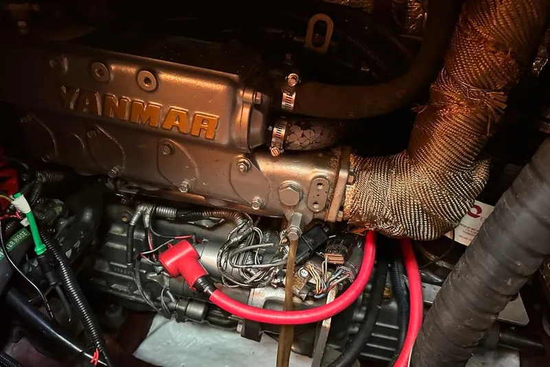 Slide: The Image of Yanmar engine control panel on a 2002 Sabre 402 sailboat, featuring gauges and switches. - 45