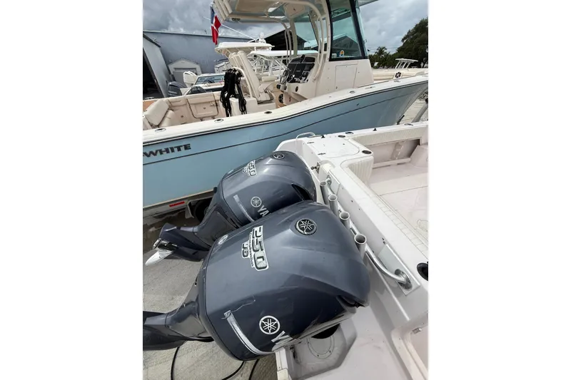 Slide: The Image of 2001 Grady-White Marlin 300 boat with twin Yamaha 250 outboard engines. - 10
