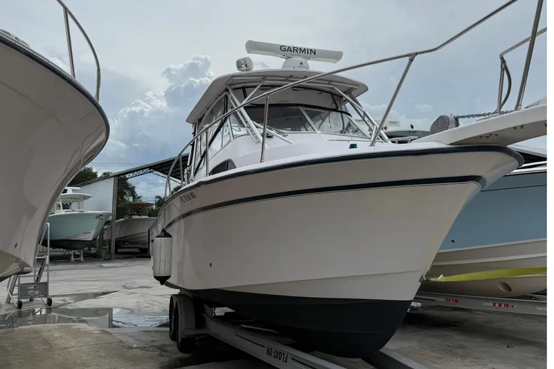 Slide: The Image of 2001 Grady-White Marlin 300 boat on trailer, equipped with Garmin radar. - 5