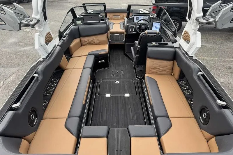 Slide: The Image of 2026 Supra SE boat interior with advanced dashboard and luxurious seating. - 10