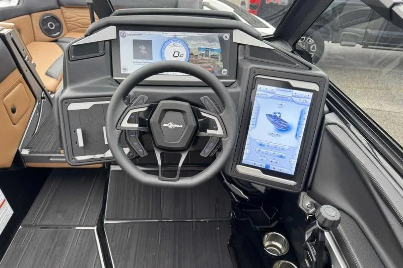 Slide: The Image of 2026 Supra SE boat interior with tan and black seating, showcasing modern design. - 12