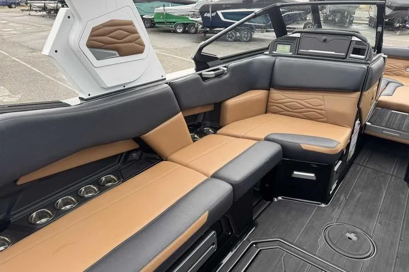 Slide: The Image of 2026 Supra SE boat interior with luxurious seating and modern design. - 8