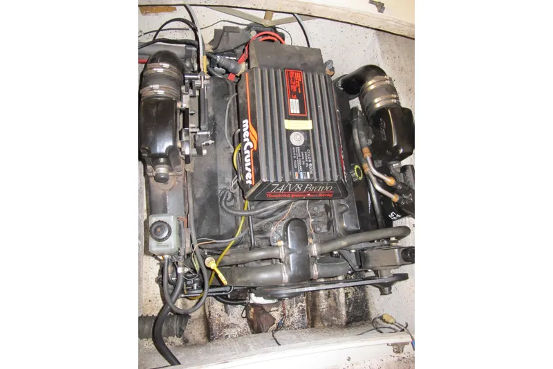 Slide: The Image of 1995 Harris FloteBote Legend 240 engine, MerCruiser 7.4L V8 Bravo, detailed view. - 12
