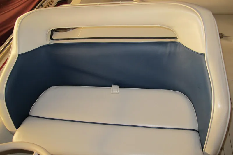 Slide: The Image of 1995 Harris FloteBote Legend 240 boat seat with blue and white upholstery. - 9