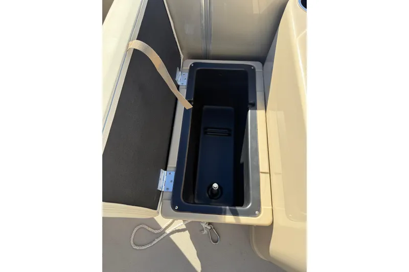 Slide: The Image of Open storage compartment on 2018 Sylvan Mirage Fish 8520 4-PT boat. - 17