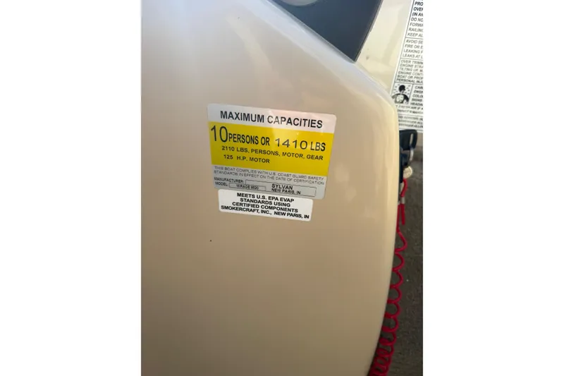 Slide: The Image of 2018 Sylvan Mirage Fish 8520 4-PT capacity label, 10 persons or 1410 lbs. - 22