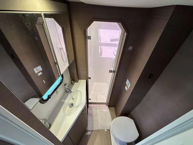 Slide: The Image of Modern bathroom in 2021 Bali 4.8 yacht with shower, sink, and toilet. - 47