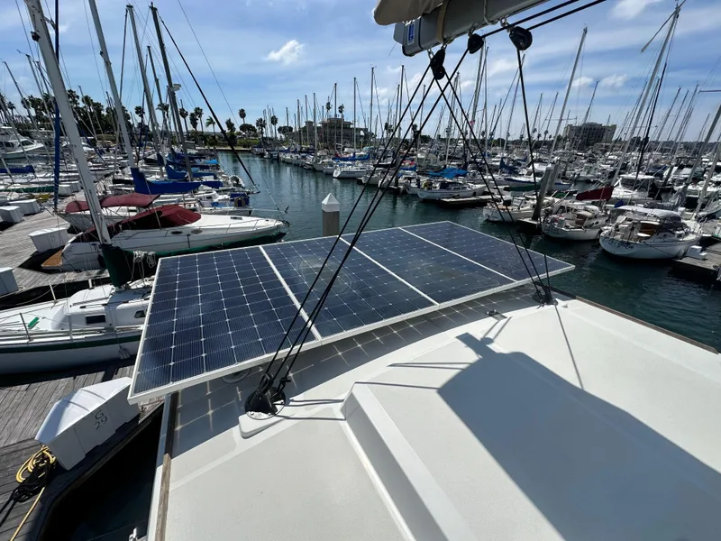 Slide: The Image of Solar panels on a 2021 Bali 4.8 yacht docked at a marina. - 9