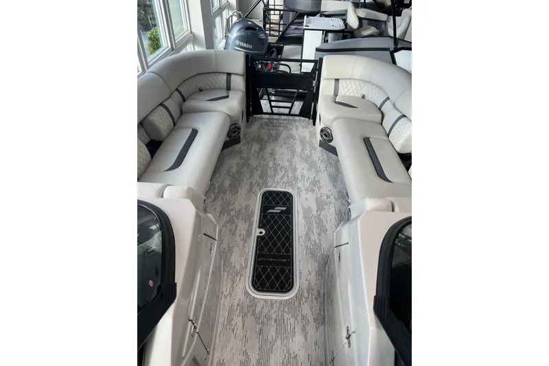 Slide: The Image of Luxurious interior of 2026 Starcraft RX 25 DL DC boat with plush seating and modern design. - 7