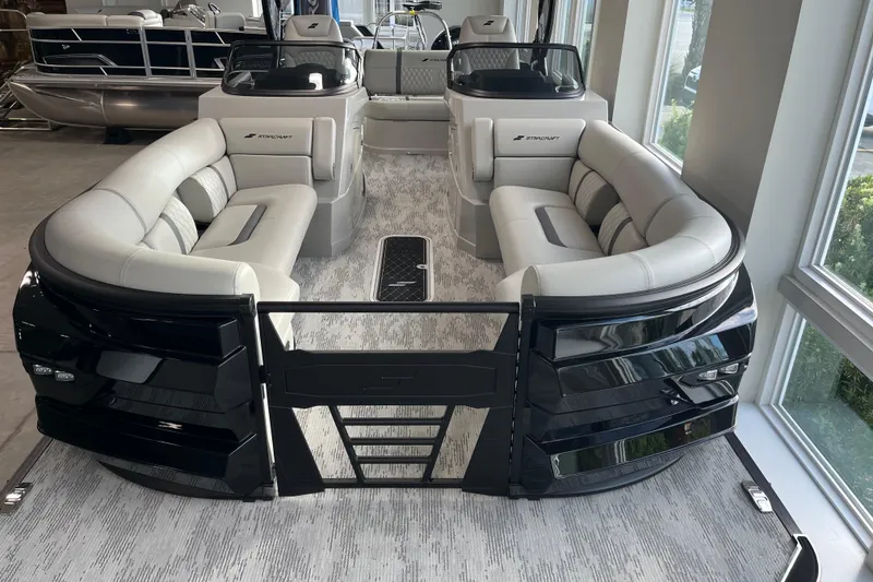 Slide: The Image of 2026 Starcraft RX 25 DL DC pontoon boat with luxurious seating and sleek design. - 8