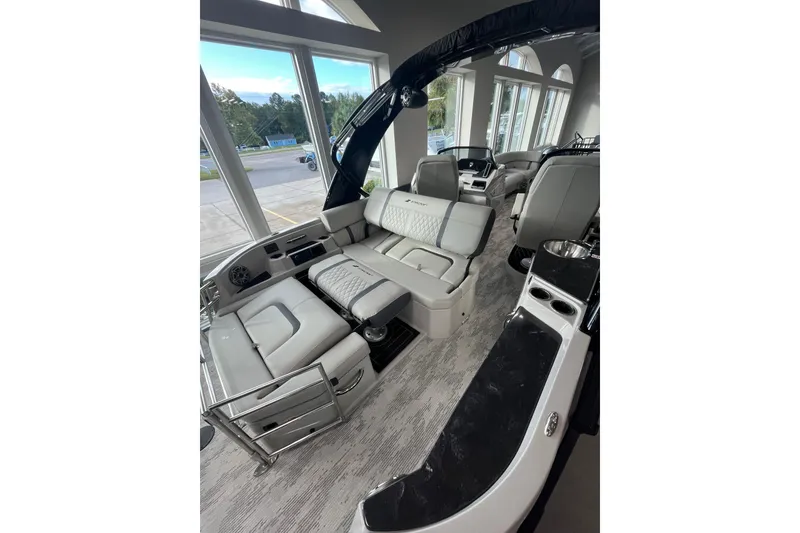 Slide: The Image of 2026 Starcraft RX 25 DL DC boat interior with luxurious seating and modern design. - 4