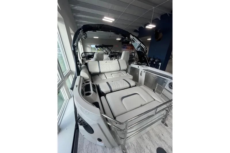 Slide: The Image of 2026 Starcraft RX 25 DL DC boat interior with luxurious seating and modern design. - 5