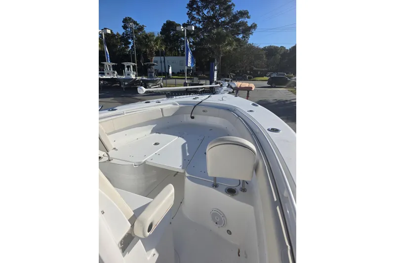 Slide: The Image of 2020 Sea Hunt Gamefish 30 Forward Seating boat, showcasing spacious deck and seating area. - 3