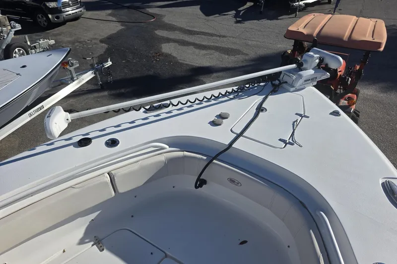 Slide: The Image of 2020 Sea Hunt Gamefish 30 Forward Seating boat with trolling motor on deck. - 4