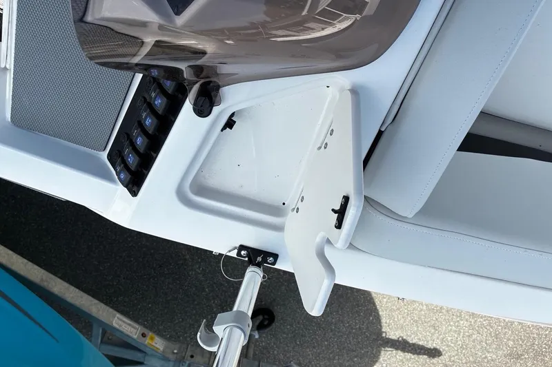 Slide: The Image of 2026 Starcraft SV 16 OB boat dashboard with controls and seating. - 15