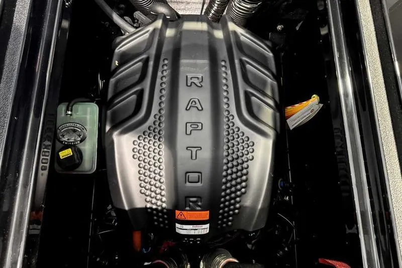 Slide: The Image of 2026 Moomba Tykon engine with Raptor branding, showcasing powerful performance features. - 14