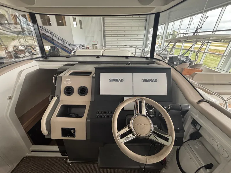 Slide: The Image of Interior cockpit of 2026 Nimbus Commuter 11 MKII Legacy Edition with dual Simrad displays. - 15