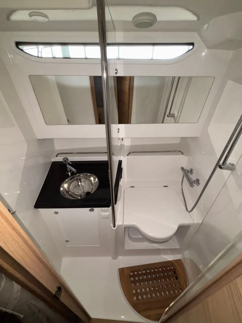 Slide: The Image of Compact bathroom in 2026 Nimbus Commuter 11 MKII Legacy Edition with sink, toilet, and shower. - 19