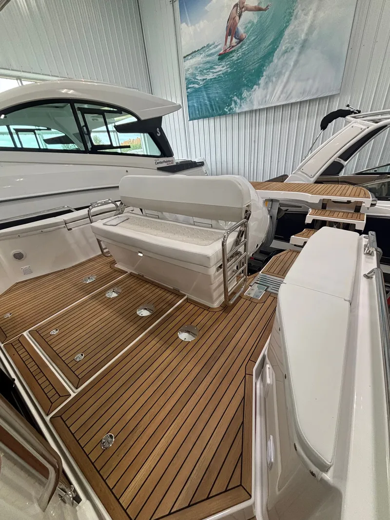 Slide: The Image of Luxury interior of 2026 Nimbus Commuter 11 MKII Legacy Edition with teak flooring and seating. - 2