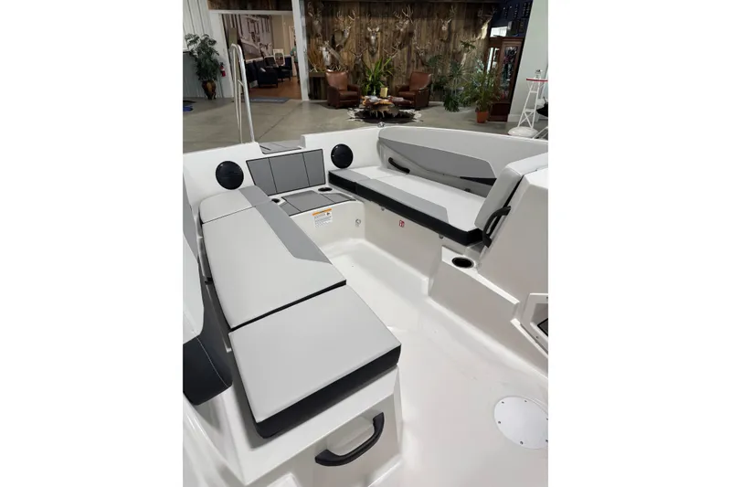 Slide: The Image of 2026 Starcraft SV 16 OB boat interior with cushioned seating and modern design. - 9