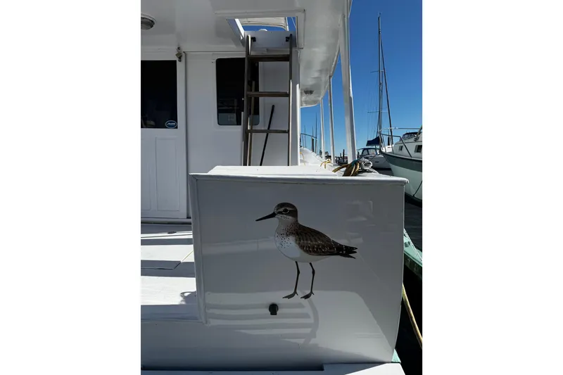 Slide: The Image of 1982 Marine Trader Europa boat helm with white seating - 29