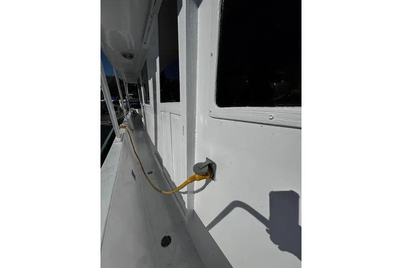 Slide: The Image of Anchor chain and windlass controls on a 1982 Marine Trader Europa boat. - 34