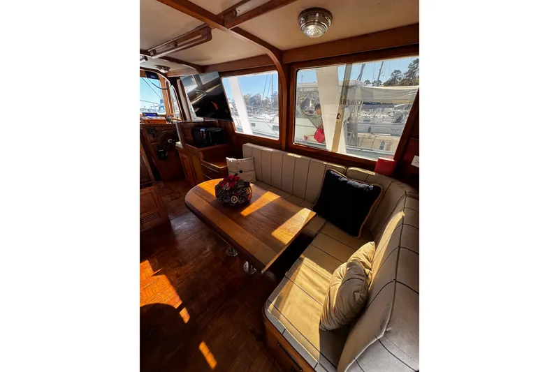 Slide: The Image of 1982 Marine Trader Europa boat anchor above water in marina setting. - 35