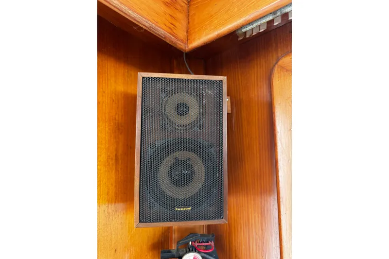 Slide: The Image of 1982 Marine Trader Europa boat dashboard with navigation instruments and controls. - 46