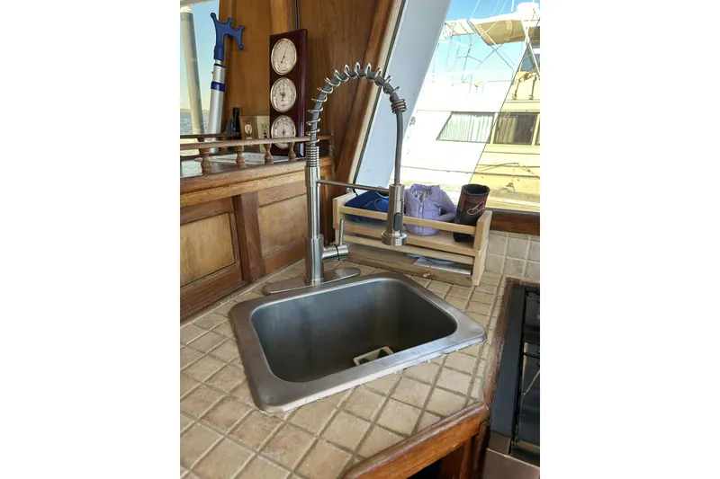 Slide: The Image of 1982 Marine Trader Europa wooden interior with modern stereo system installed. - 55