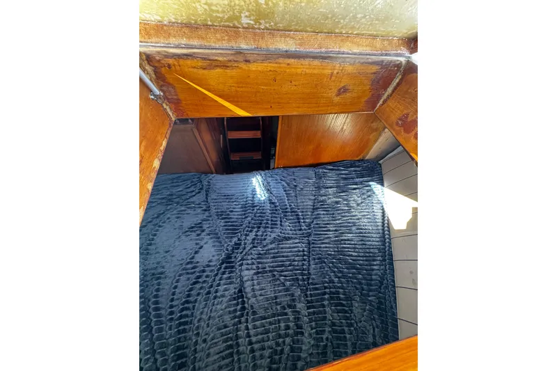 Slide: The Image of 1982 Marine Trader Europa interior with gauges, ample electrical outlets, and vent. - 58