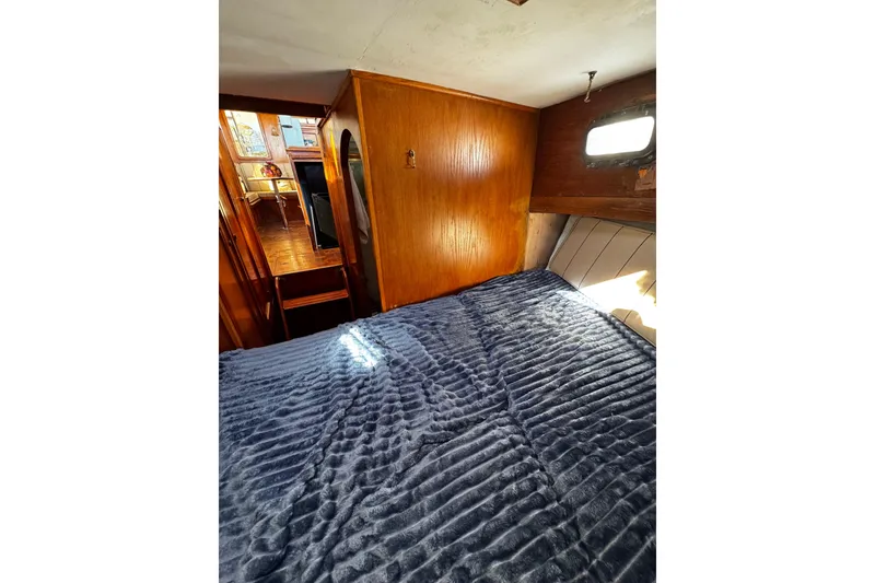 Slide: The Image of Roku TV with remote inside 1982 Marine Trader Europa boat cabin - 60