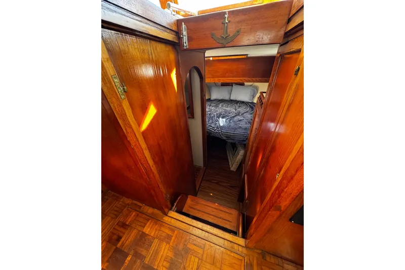 Slide: The Image of Hisense Roku TV remote with streaming service buttons on a black surface. - 61