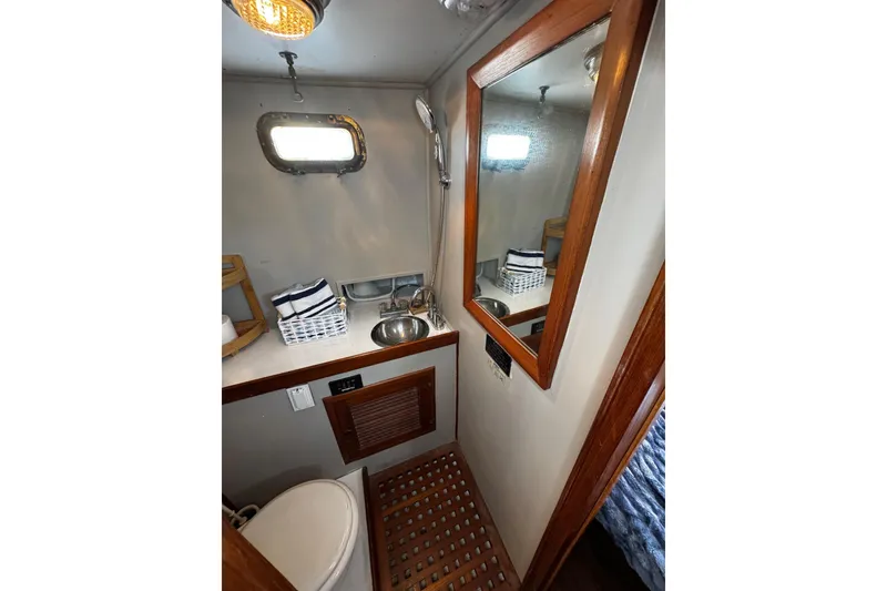 Slide: The Image of 1982 Marine Trader Europa interior with cozy bedding - 73