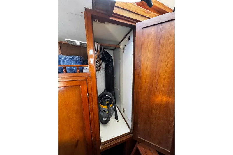 Slide: The Image of deep closet space in the captains quarters. - 77