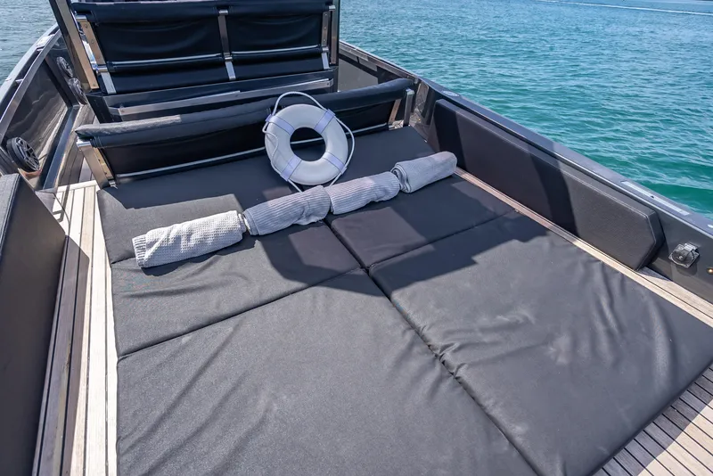 Slide: The Image of Luxurious 2012 Wally 43 yacht deck with sunbathing area and life preserver. - 12
