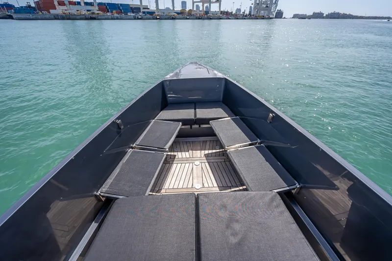 Slide: The Image of Bow view of 2012 Wally 43 boat with seating, docked in a harbor. - 22