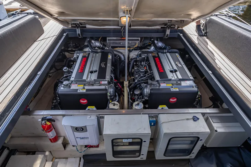Slide: The Image of Engine compartment of a 2012 Wally 43 boat, featuring twin engines and safety equipment. - 24