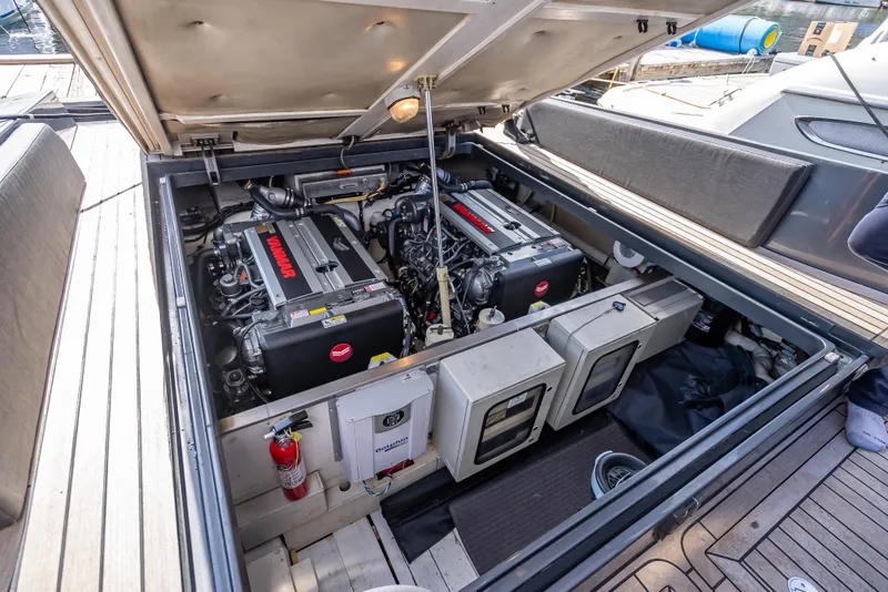 Slide: The Image of Engine compartment of a 2012 Wally 43 yacht, showcasing dual engines and equipment. - 25