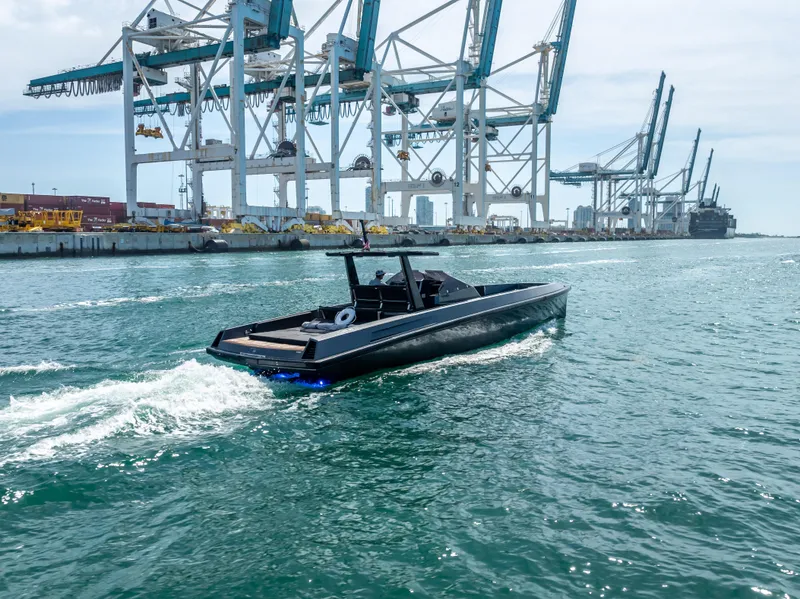 Slide: The Image of Wally 43 yacht cruising near industrial port cranes, 2012 model. - 5
