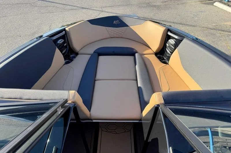 Slide: The Image of Engine of 2026 MasterCraft NXT23 boat with Ilmor branding and blue components. - 13