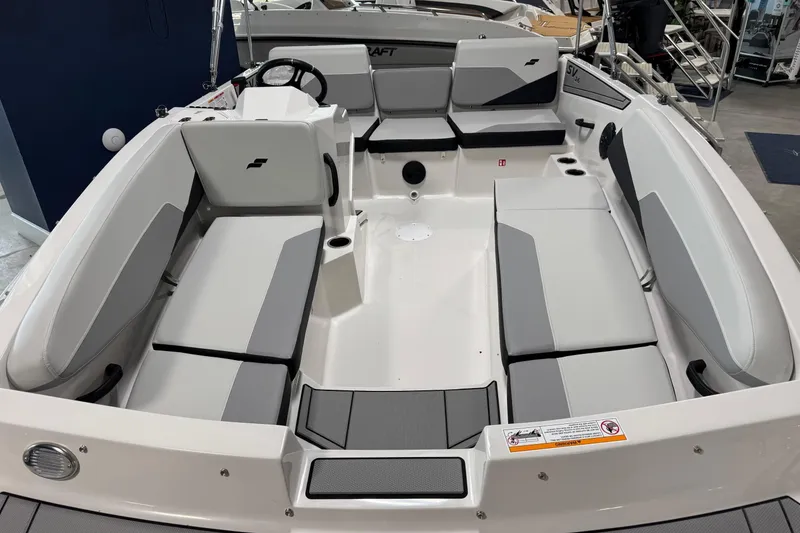 Slide: The Image of 2026 Starcraft SV 16 OB boat interior with gray seating and modern design. - 5