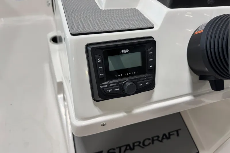 Slide: The Image of 2026 Starcraft SV 16 OB boat dashboard with Wet Sounds audio system. - 18
