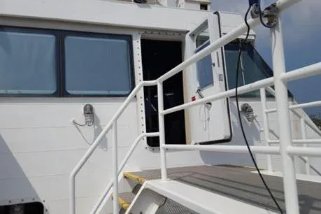 Slide: The Image of Crew transport vessel entrance with open door, FBMA Philippines SWATH Slice, 2006 model. - 4