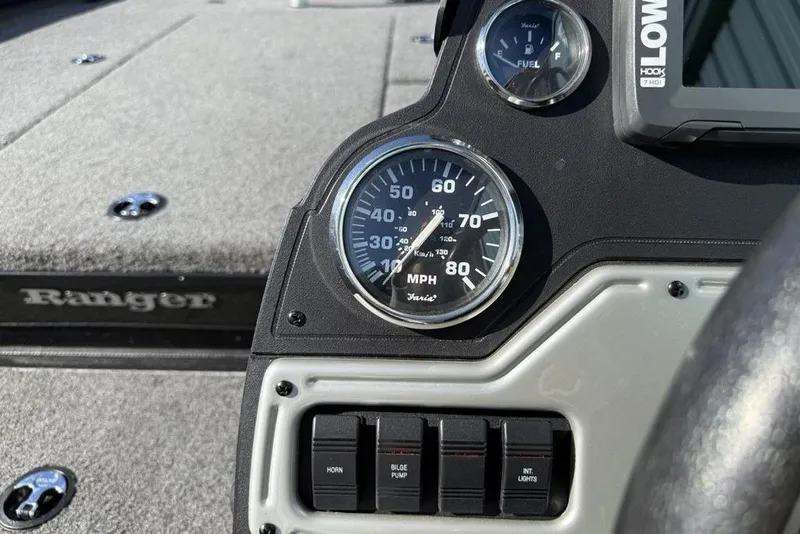 Slide: The Image of 2018 Ranger RT198P boat carpeted storage compartment with lock. - 11