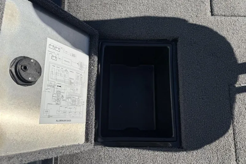 Slide: The Image of 2018 Ranger RT198P boat interior with cup holders and storage compartment. - 20