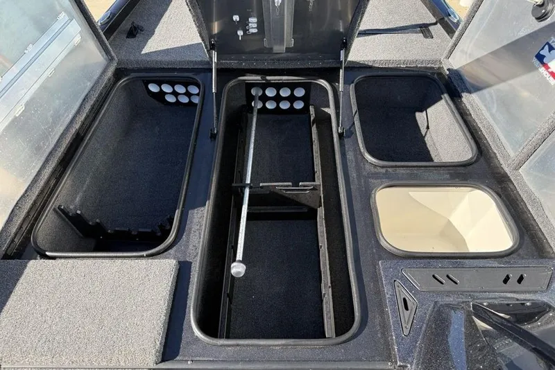 Slide: The Image of 2018 Ranger RT198P boat storage compartments, open and empty, showcasing organized interior layout. - 4